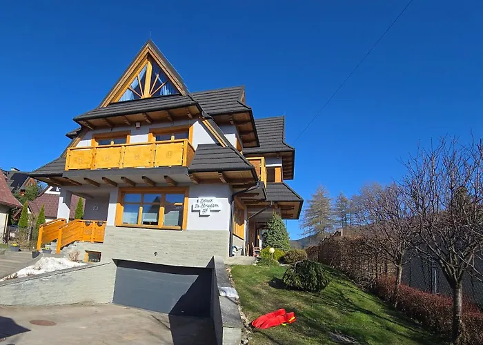 Domek za Strugiem - pokoje i apartamenty